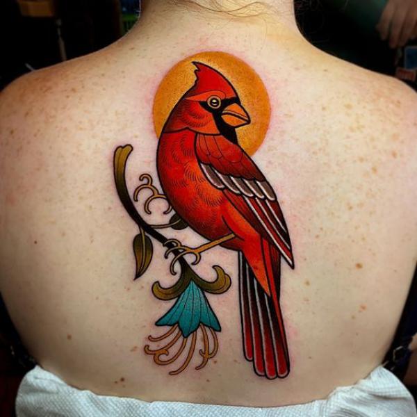 Red cardinal back tattoo