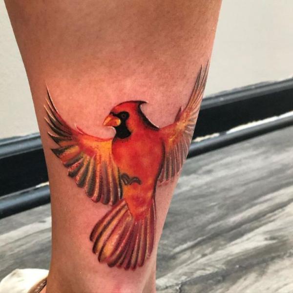 Red cardinal in flight tattoo