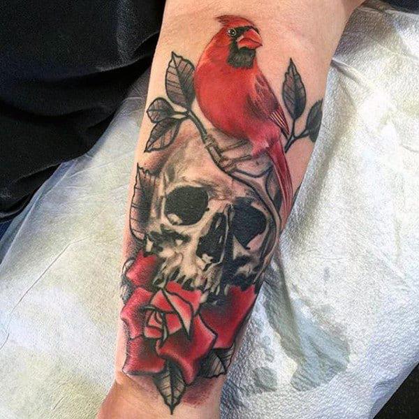 Red cardinal with skull and rose tattoo