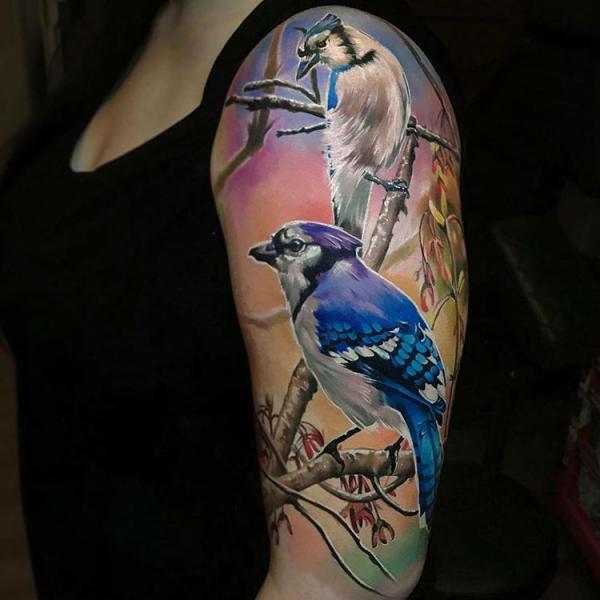 Reslistic two Blue Jay perched on branch half sleeve tattoo
