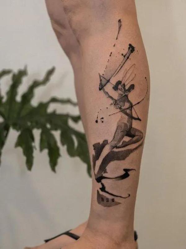Sagittarius archer lower leg tattoo