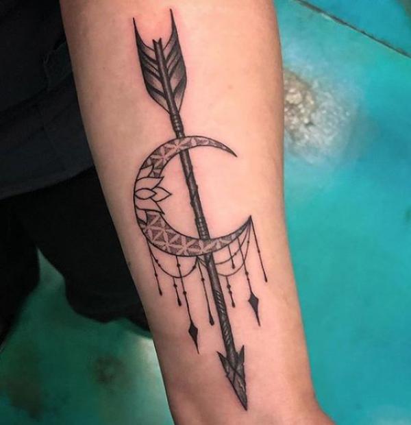 Sagittarius arrow and crescent moon tattoo