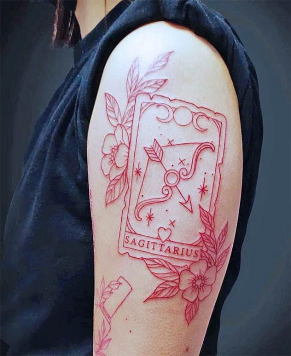 Sagittarius card with bow and arrow red line work tattoo