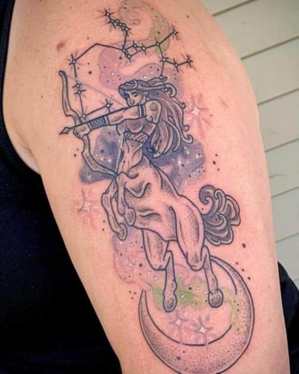 Sagittarius centaur with constellation crescent moon tattoo
