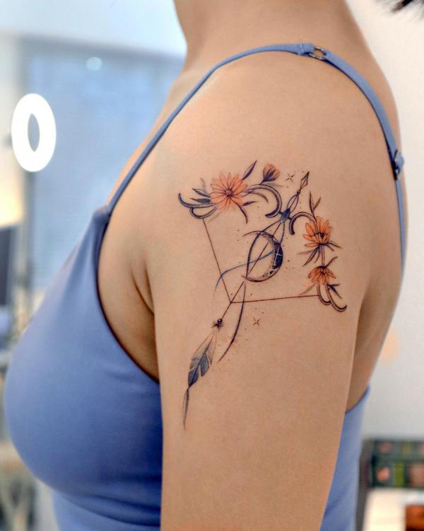 Sagittarius daisy bow and arrow with crescent moon tattoo