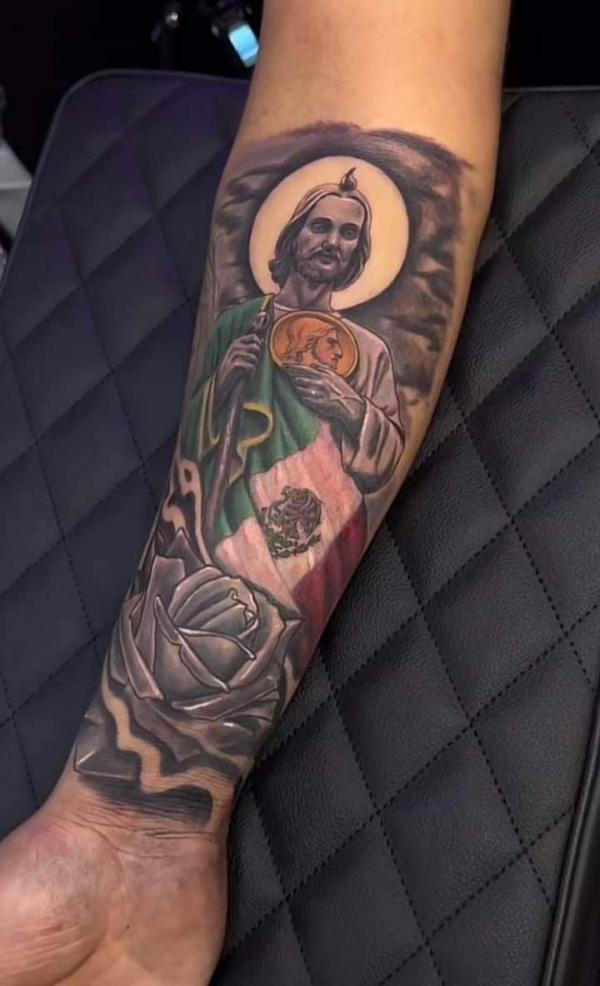 Saint Jude with Mexican flag and rose tattoo
