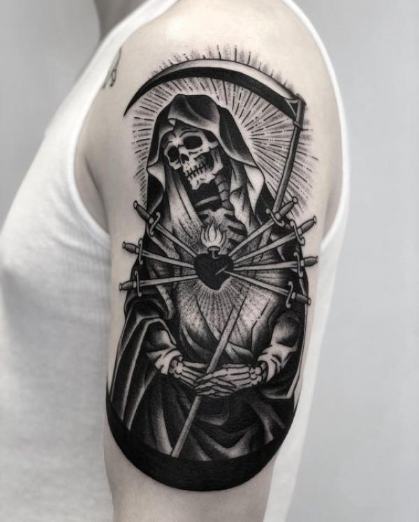 Santa Muerte holding scythe and immaculate heart tattoo