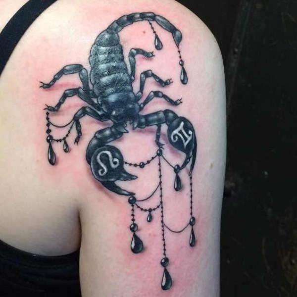 Scorpion with leo and Gemini glyph tattoo