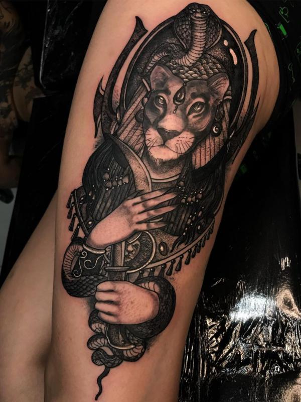 Sekhmet tattoo thigh