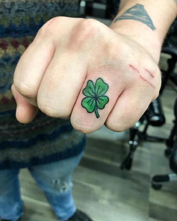 Shamrock finger tattoo