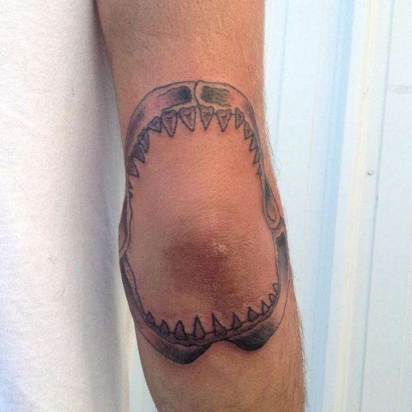 Shark Jaws elbow tattoo black and grey