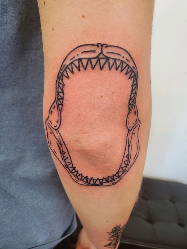 Shark Jaws line work elbow tattoo