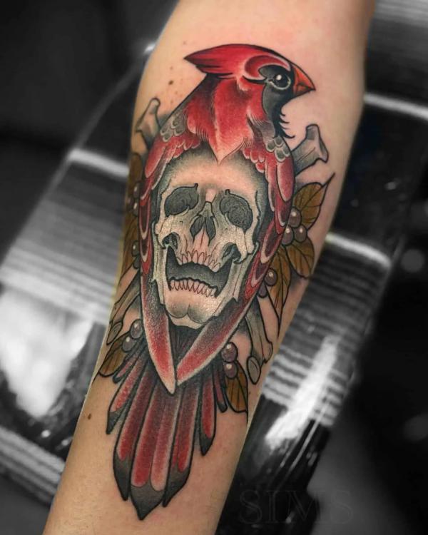 Skull cardinal forearm tattoo