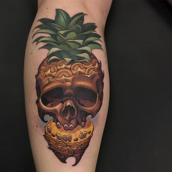 Sliced Pineapple Skull calf tattoo