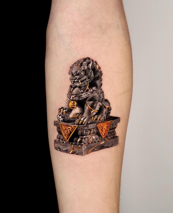 Small Foo dog statue tattoo
