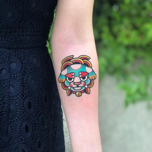 Small foo dog tattoo