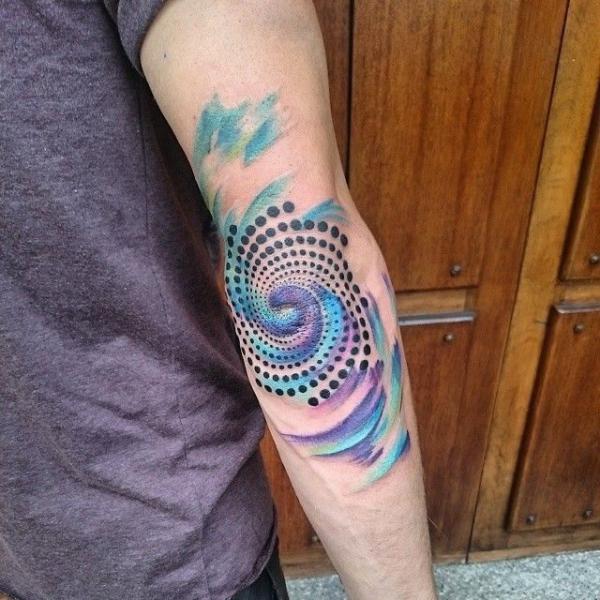 Spiral swirl elbow tattoo