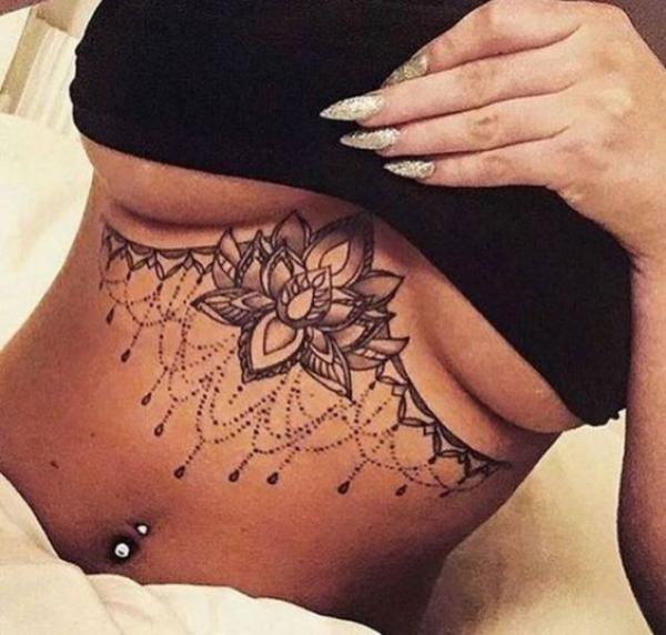 Stylized lotus with pendant underboob tattoo