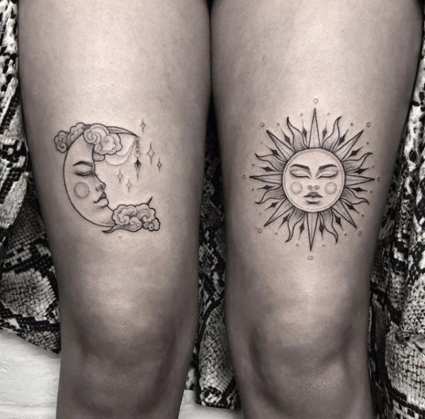 Sun and moon face above knee tattoo