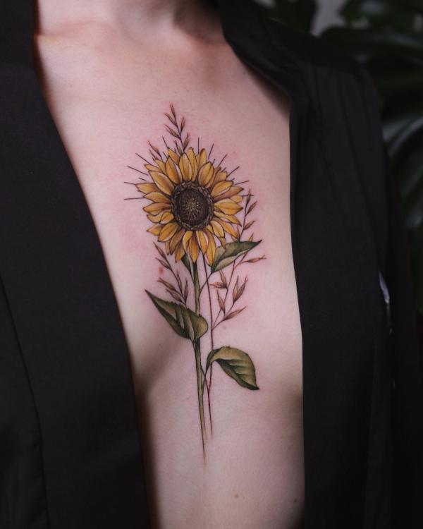 Sunflower sternum tattoo