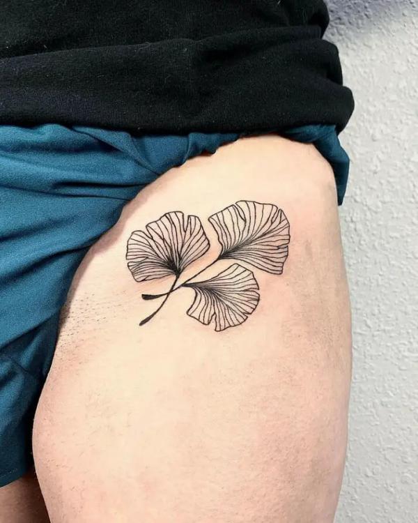 Three ginkgo leaf line work tattoo