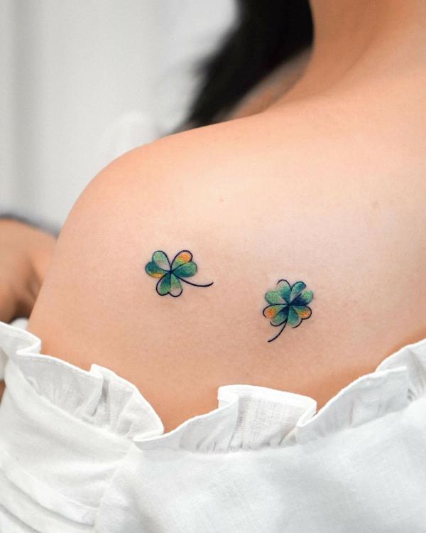 Three leaf clover and Shamrock shoulder blade tattoo