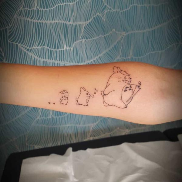 Three totoros walking outline forearm tattoo
