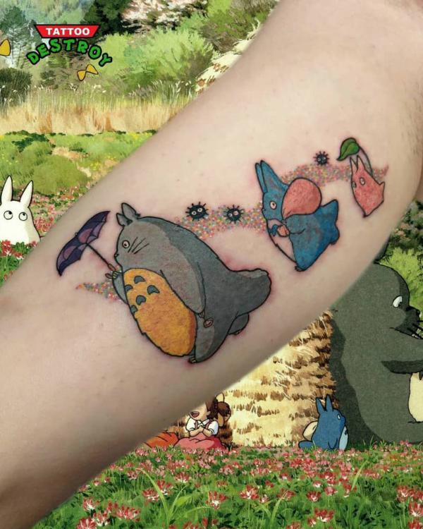 Three totoros walking with Soot Sprites tattoo
