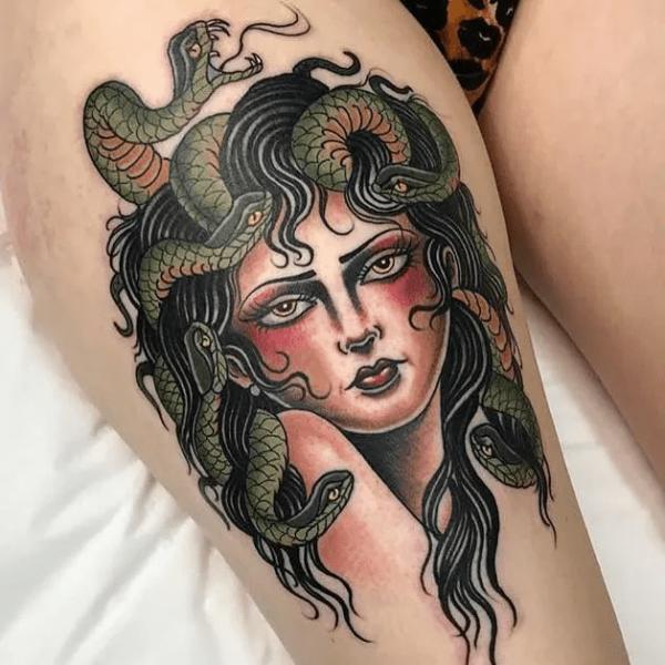 Traditional Medusa thigh tattoo