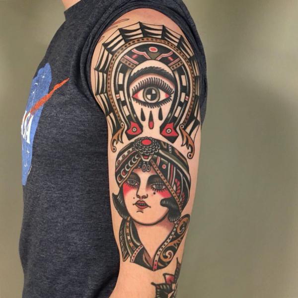 Traditional woman and horseshoe spider web with eye half sleeve tattoo