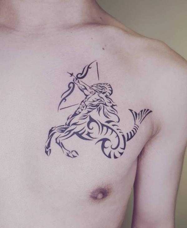 Tribal Sagittarius chest tattoo