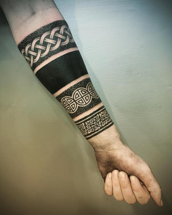 Tribal armband half sleeve tattoo