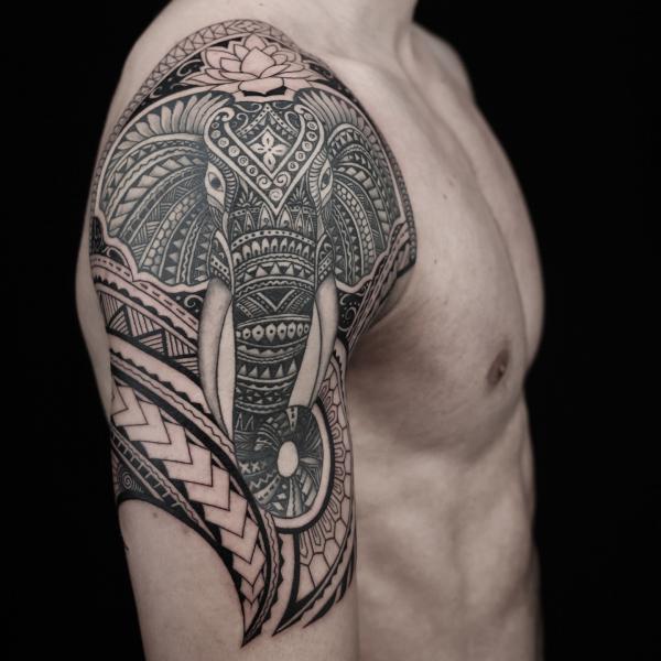 Tribal elephant shoulder to sleeve tattoo