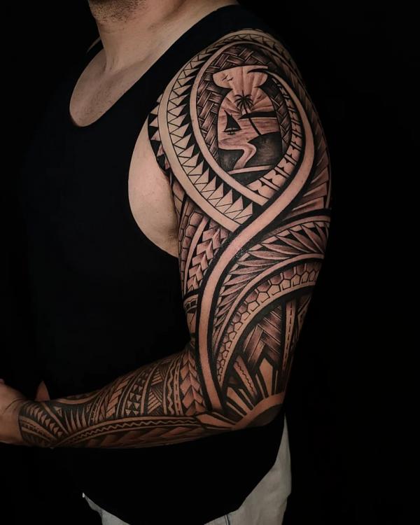 Tribal full sleeve with beach tattoo