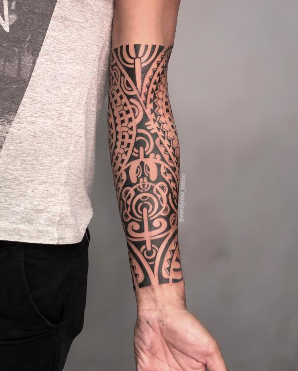 Tribal half sleave tattoo
