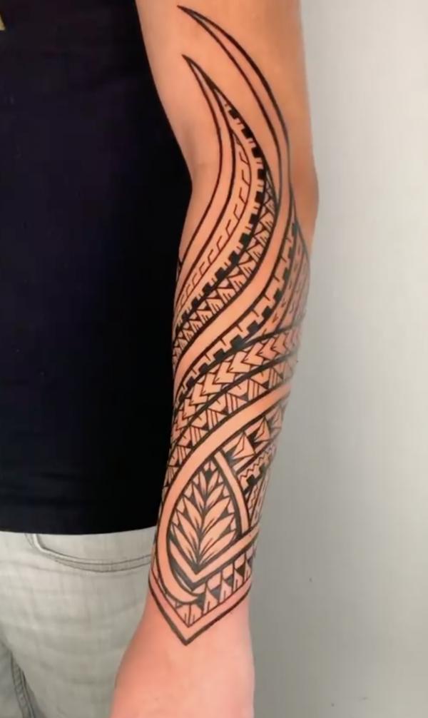 Tribal half sleeve tattoo for men