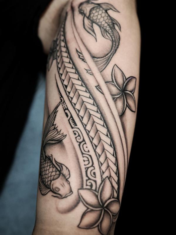 Tribal half sleeve with koi fish and flowers tattoo