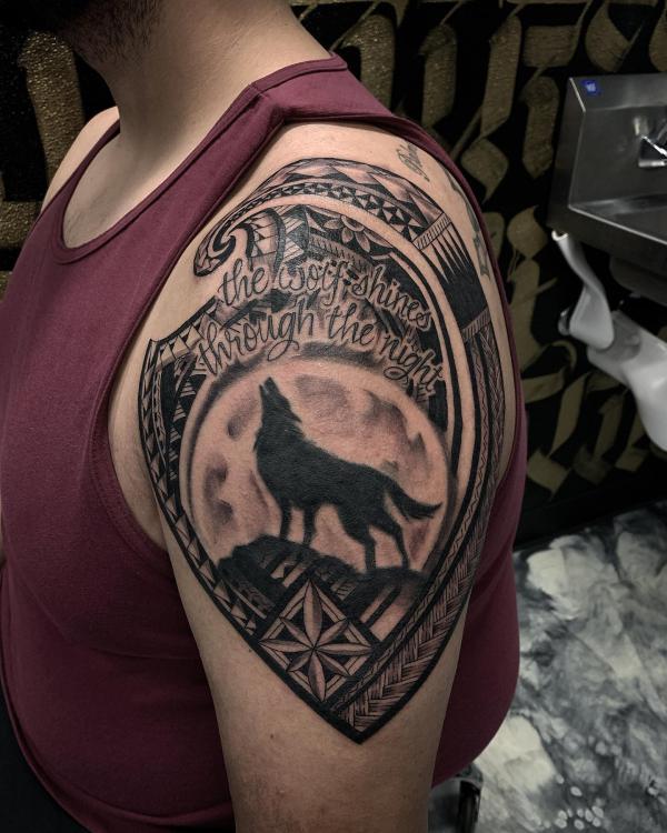 Tribal quarter sleeve with wolf tattoo
