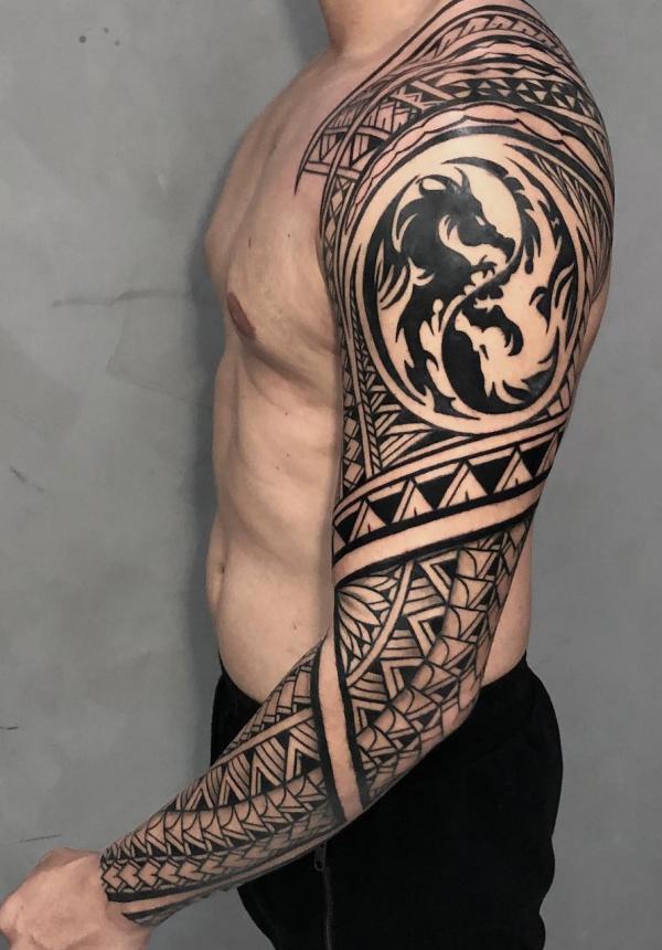 Tribal sleeve with Yin Yang dragon tattoo