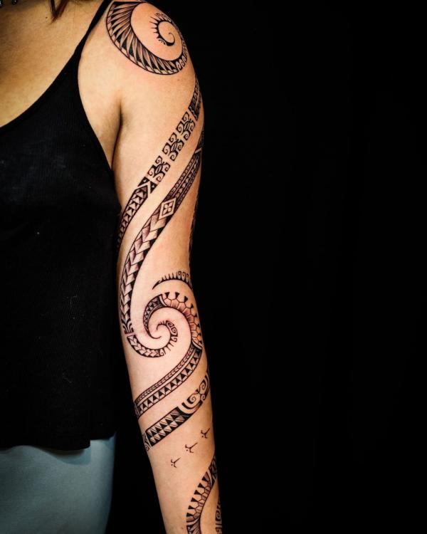 Tribal swirls tattoo sleeve for women