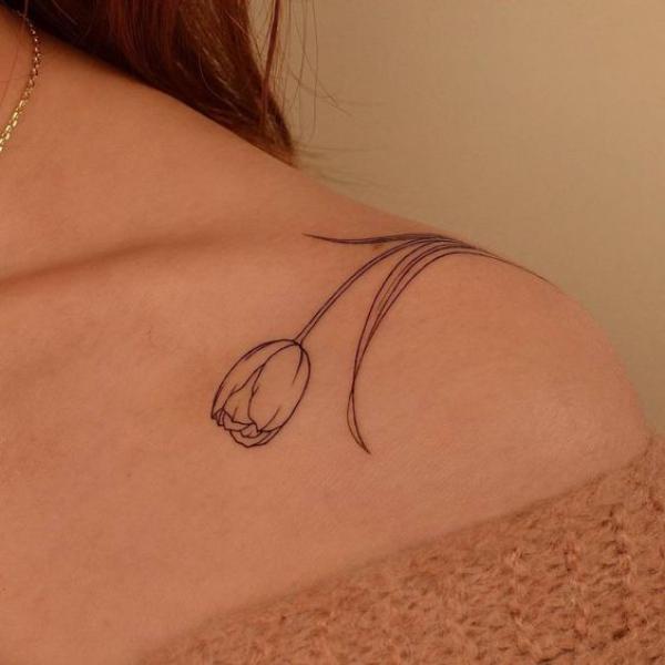 Tulip outline shoulder tattoo
