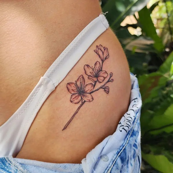 Vintage cherry blossom Bikini line tattoo