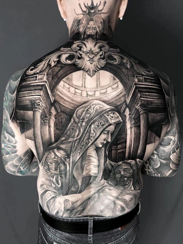 Virgin Mary taking care of Jesus tattoo