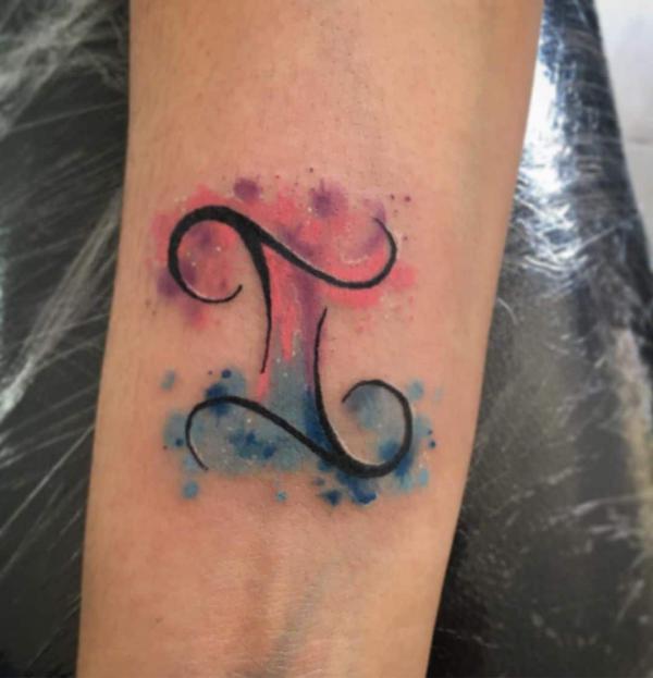 Watercolor Gemini glyph arm tattoo