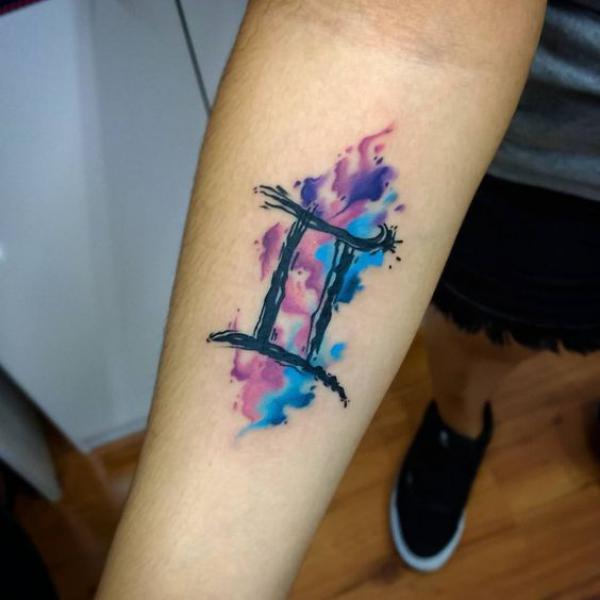 Watercolor Gemini glyph forearm tattoo