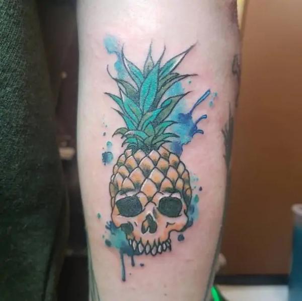 Watercolor Pineapple skull tattoo