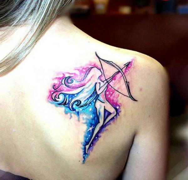 Watercolor Sagittarius female archer shoulder blade tattoo