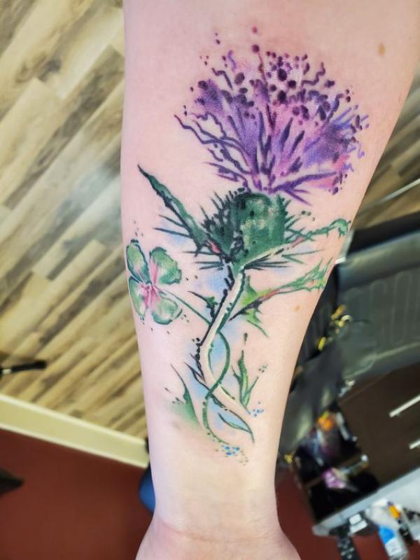 Watercolor thistle and shamrock tattoo