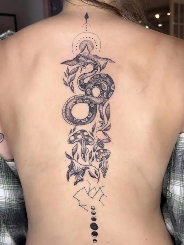 Zodiac Sagittarius snake with mushingroom butterfly back tattoo