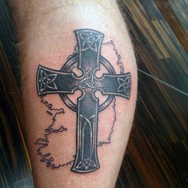 celtic cross with trinity knot with map tattoo